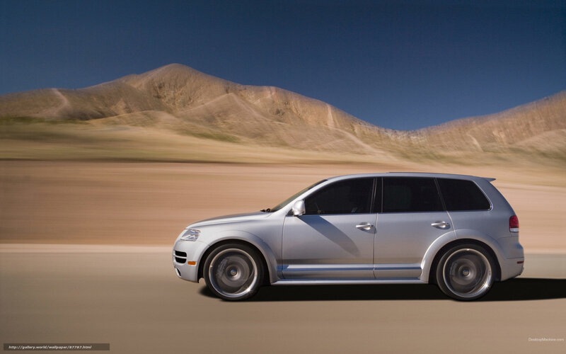 silver suv on desert road