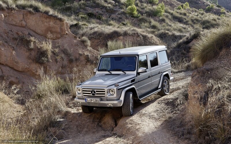 Silver SUV on Dirt Path — Gray