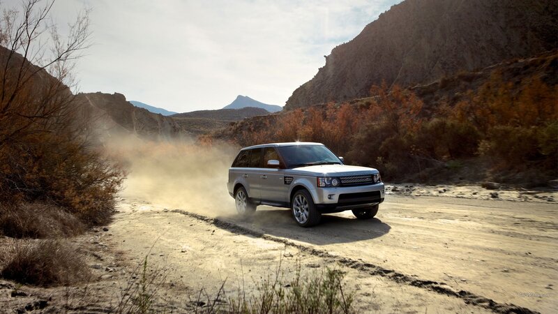 Silver Suv on Dirt Road — Brown, Dramatic