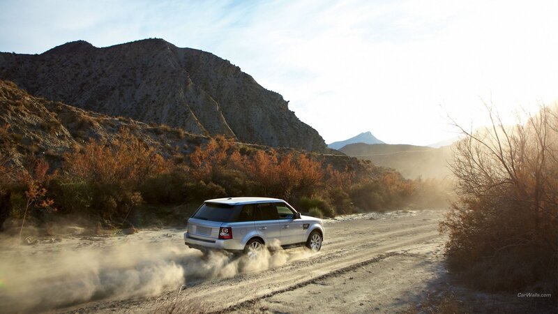 Silver SUV on Dirt Road — Brown