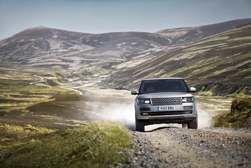 Silver SUV on Dirt Road — Green