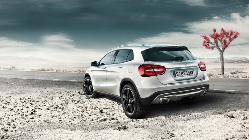 Silver SUV on Gravel — White