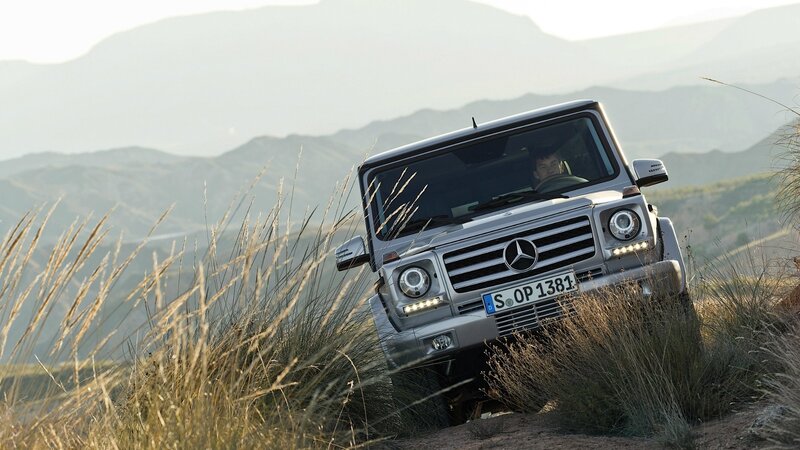 Silver Suv on Hillside — Gray, Dramatic