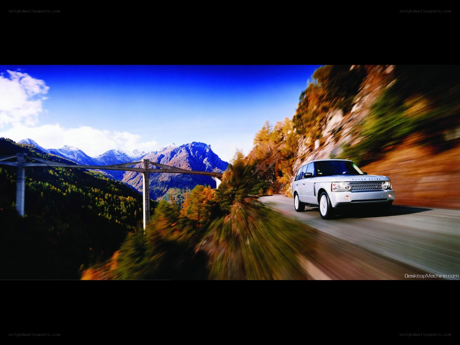 Silver SUV on mountain road
