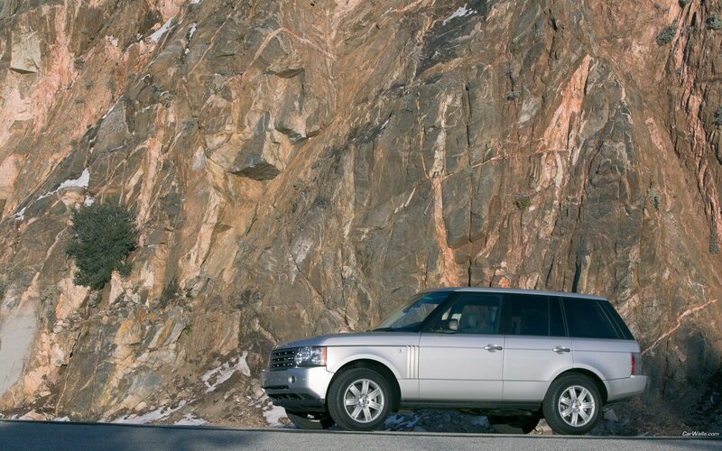 Silver SUV on mountain road