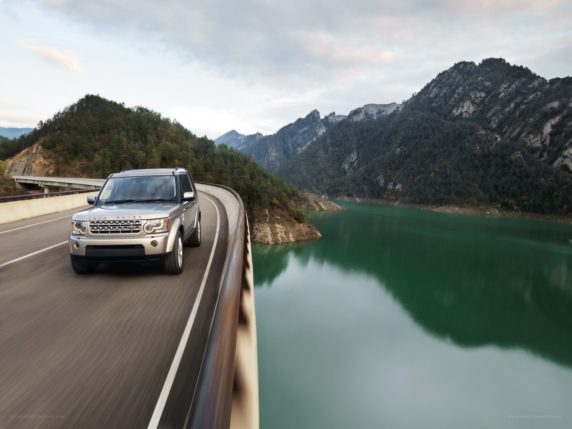 Silver SUV on mountain road