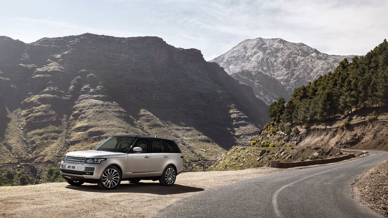 Silver SUV on Mountain Road — Gray, Serene
