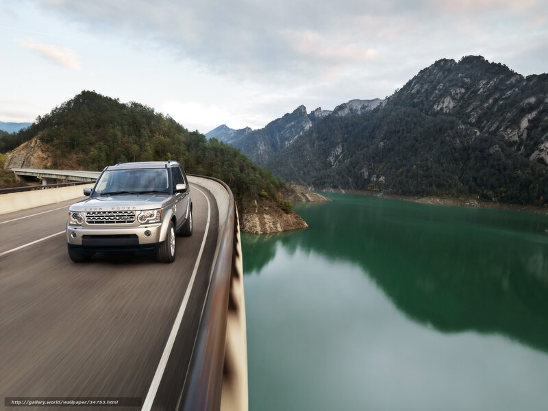 Silver SUV on mountain road