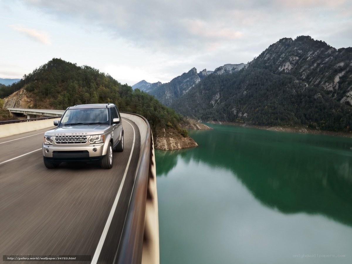 Silver SUV on mountain road