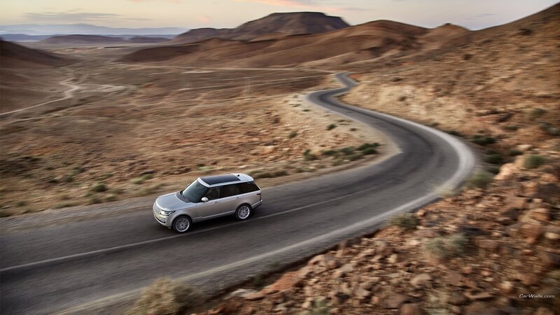 Silver Suv on Road — Brown