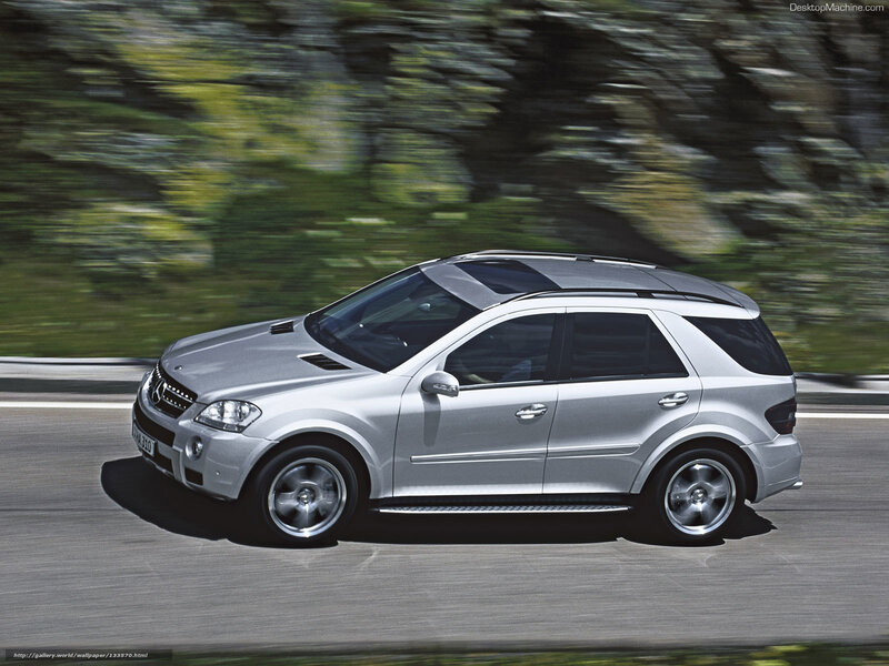 Silver SUV on Road — Dynamic