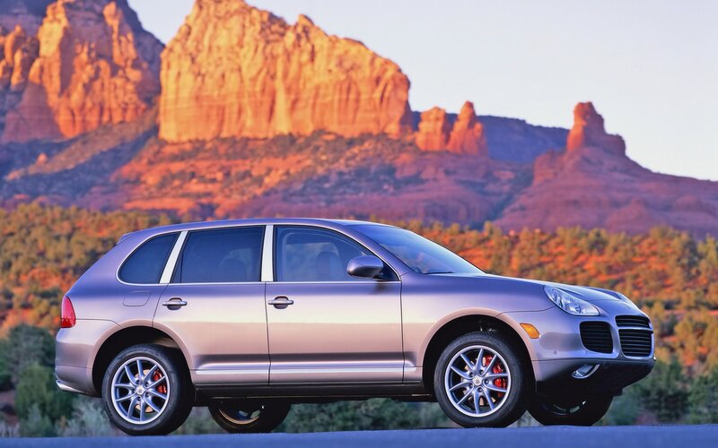 Silver Suv on Road — Serene, Sunset