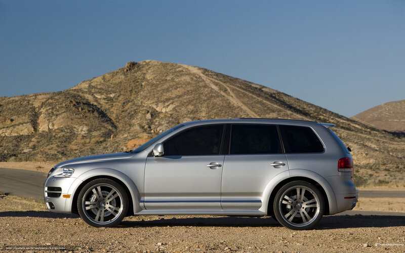 Silver Suv on Road — Serene