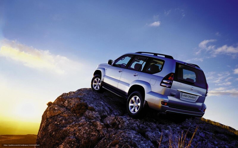 Silver Suv on Rock — Blue, Dramatic