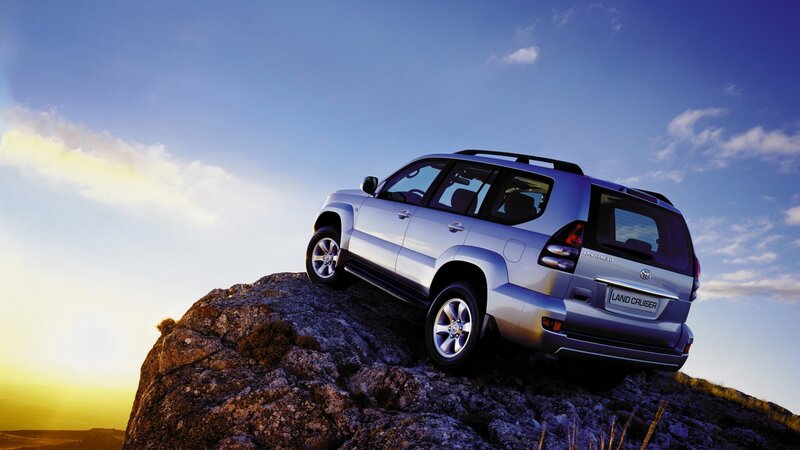 Silver Suv on Rock — Blue