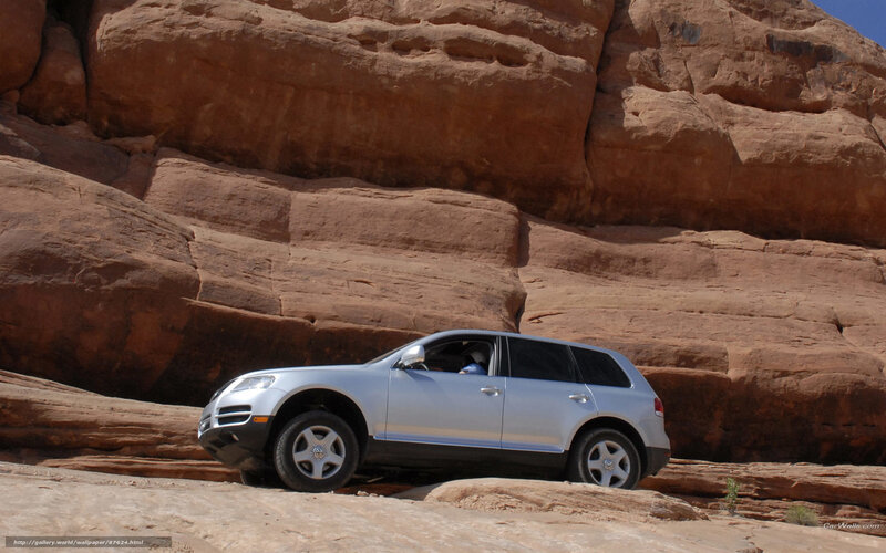 Silver Suv on Rocks