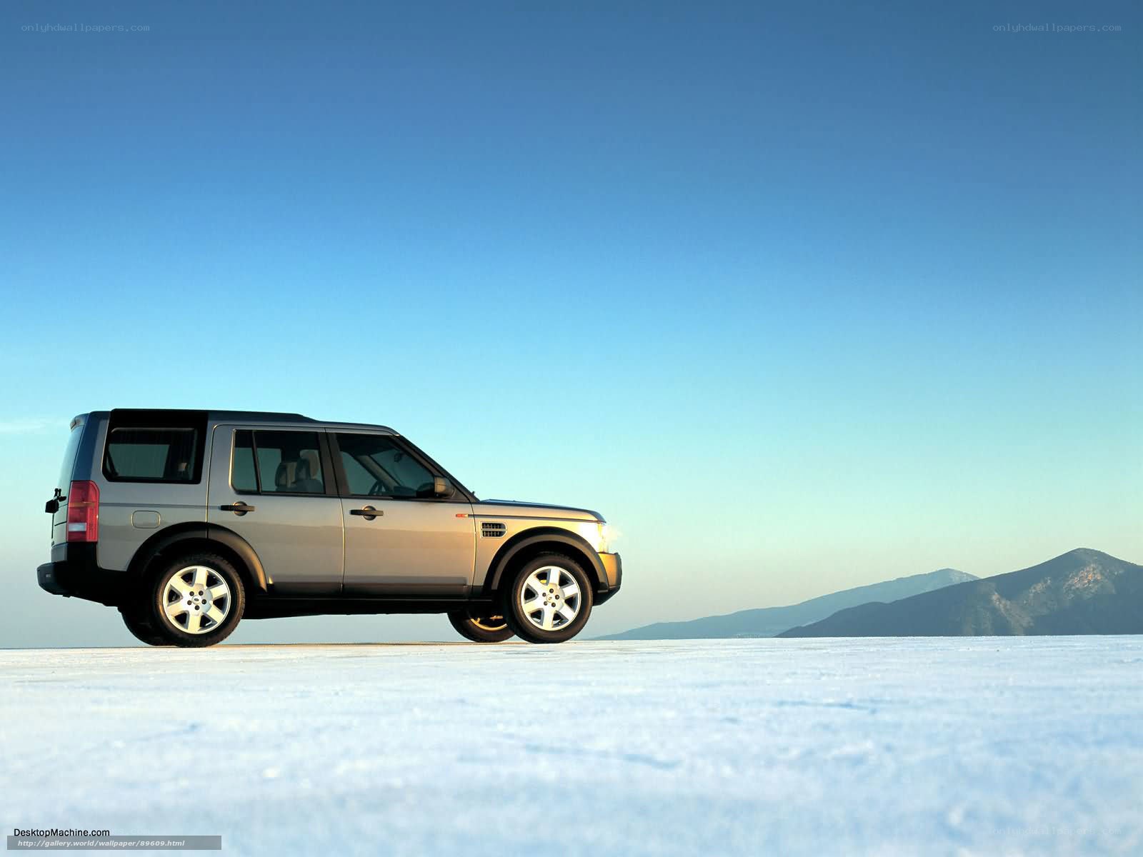 silver suv on snowy plain