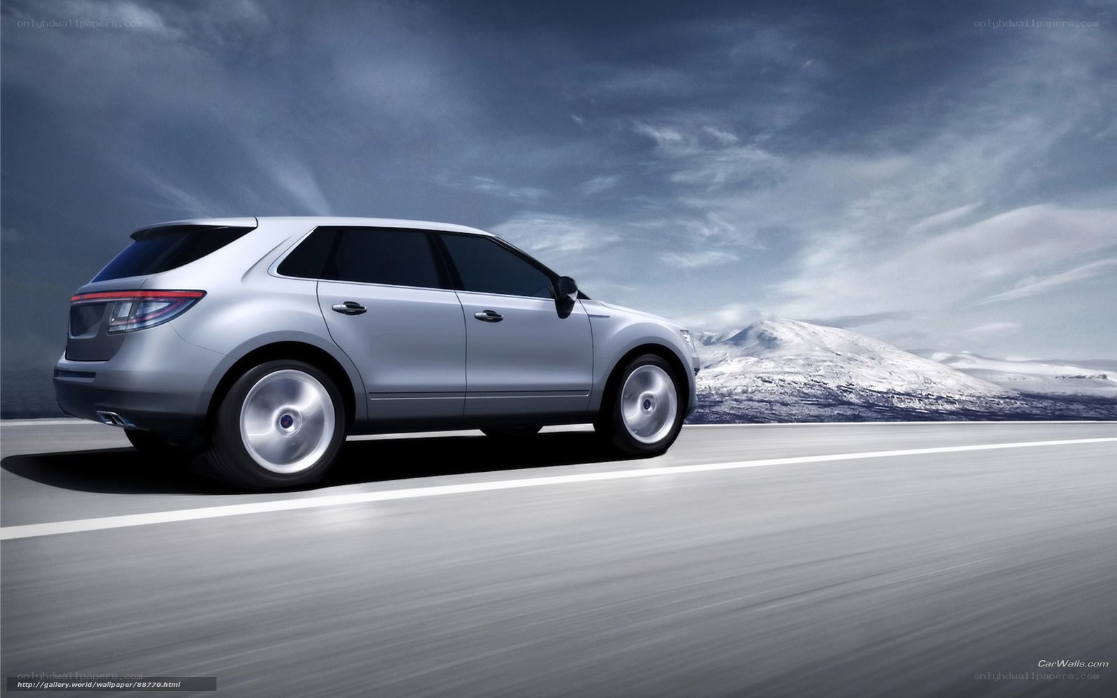 silver suv on snowy road