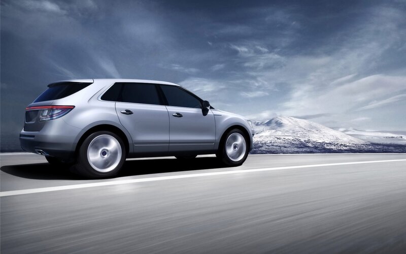 silver suv on snowy road