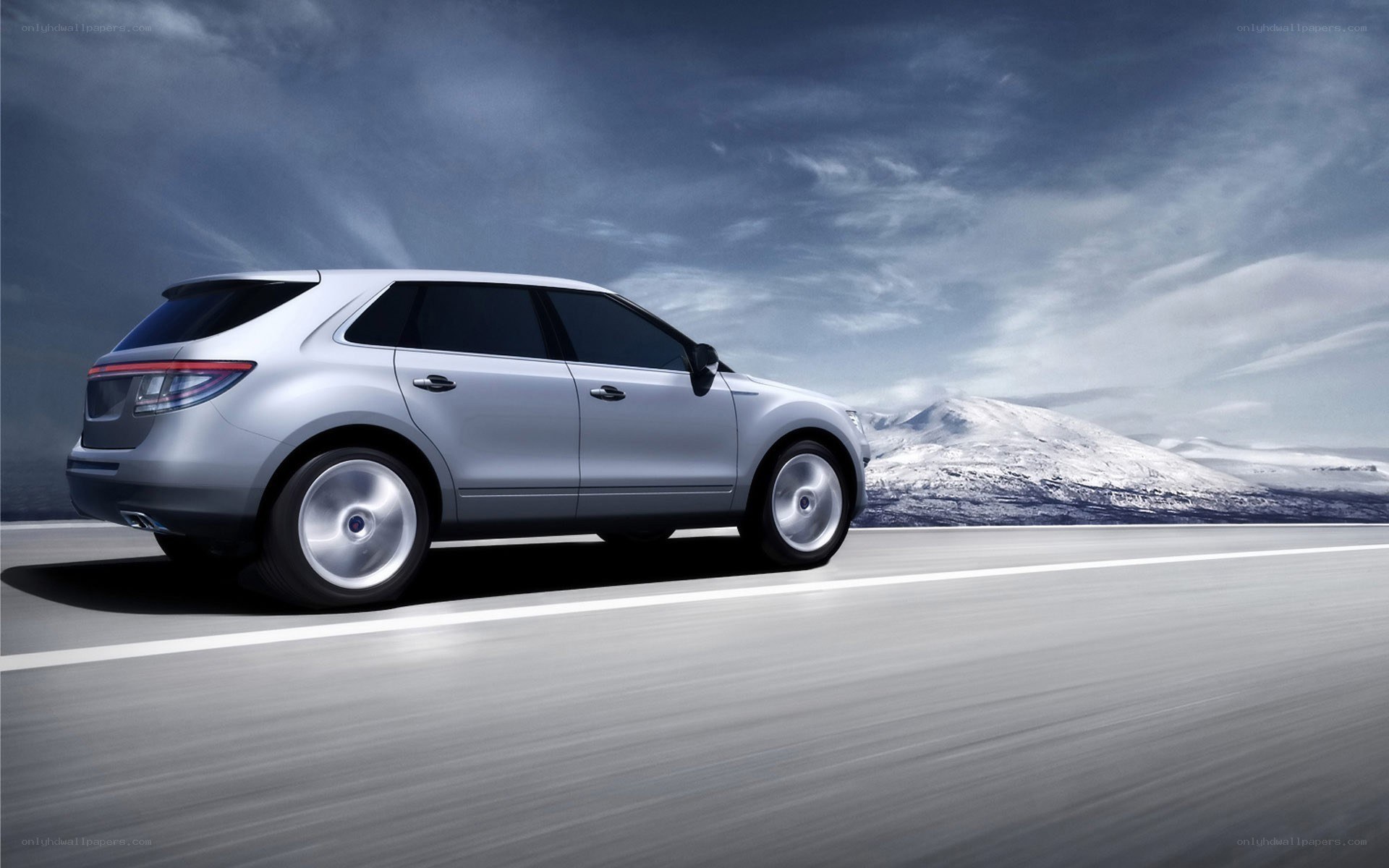 silver suv on snowy road