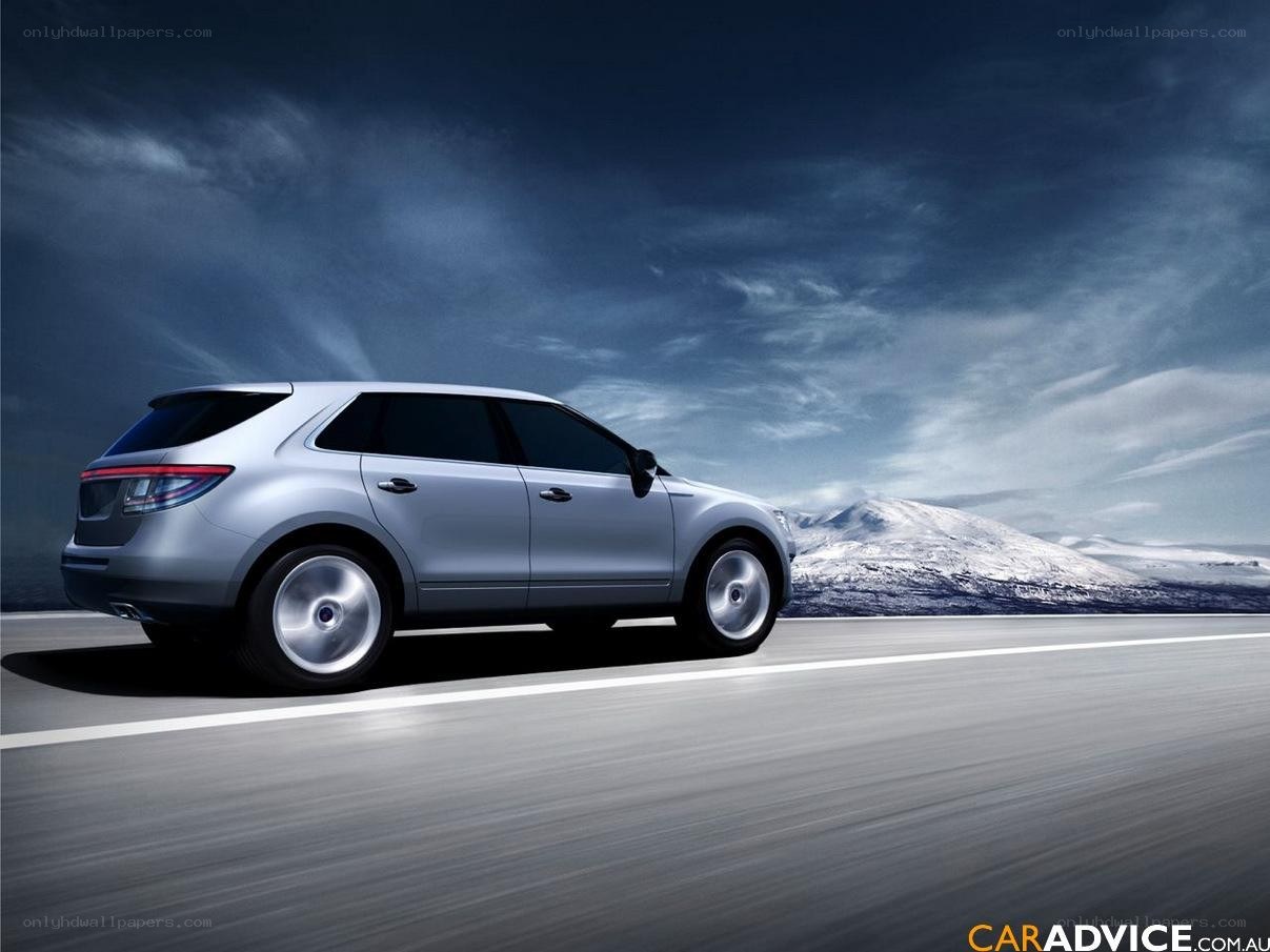 silver suv on snowy road