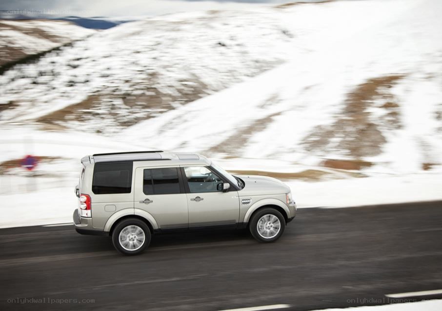 silver suv on snowy road