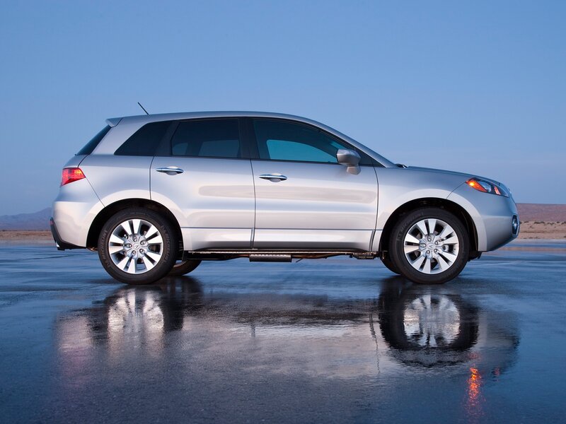 Silver Suv on Wet Surface — Serene