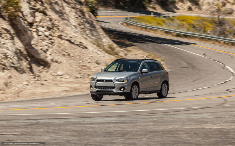 silver suv on winding road