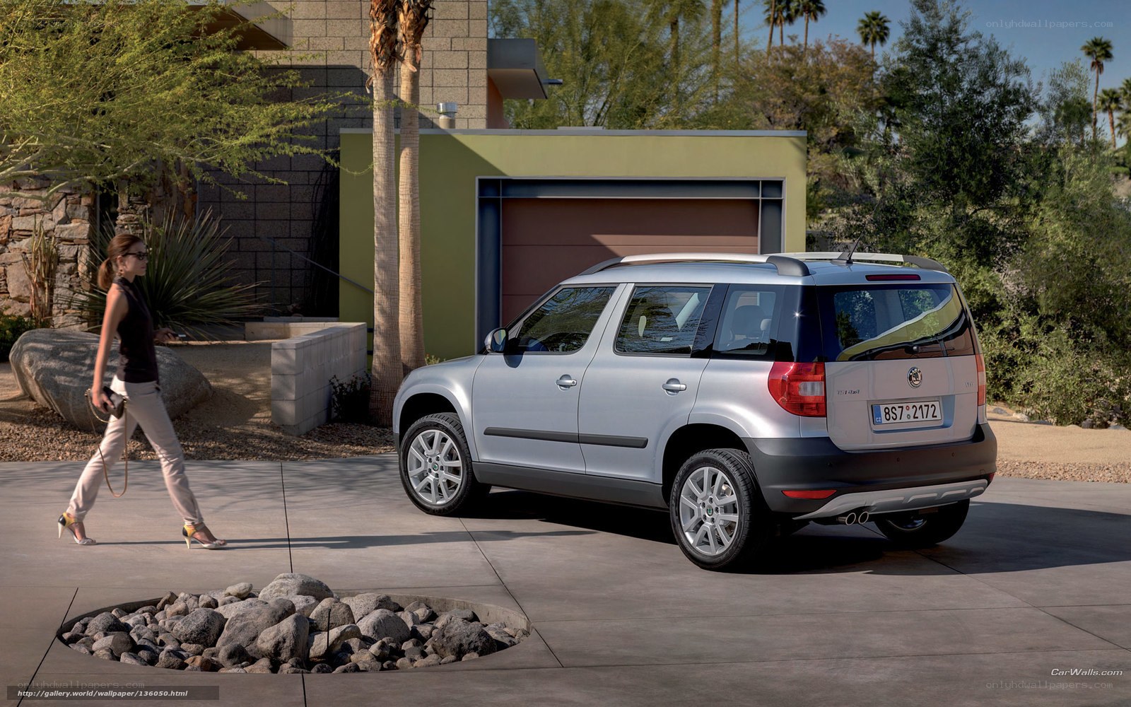 Silver SUV parked in driveway