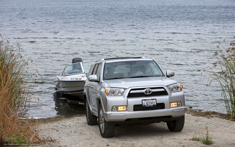 Silver Suv Towing Boat — Calm