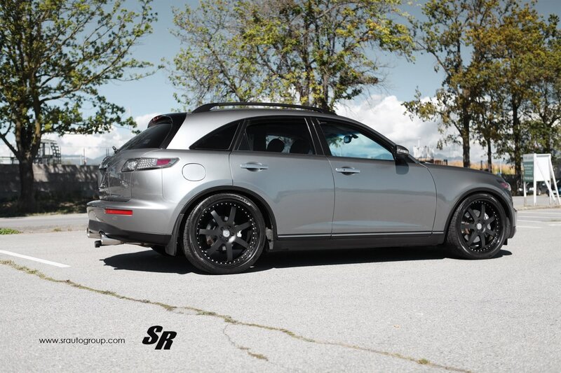 silver suv with black wheels