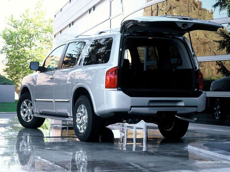 silver suv with open trunk