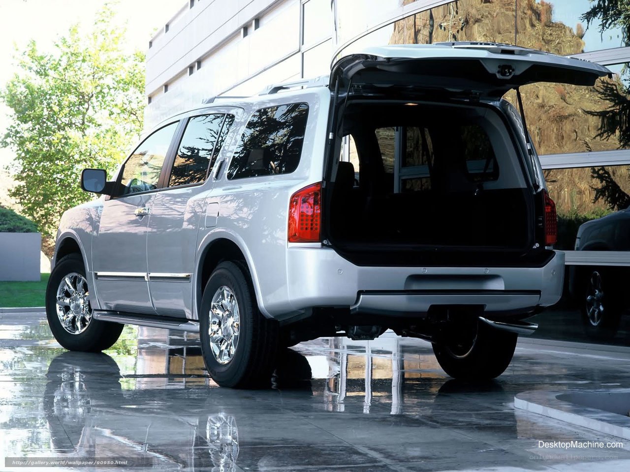 silver suv with open trunk