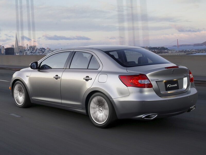 silver suzuki kizashi on a bridge