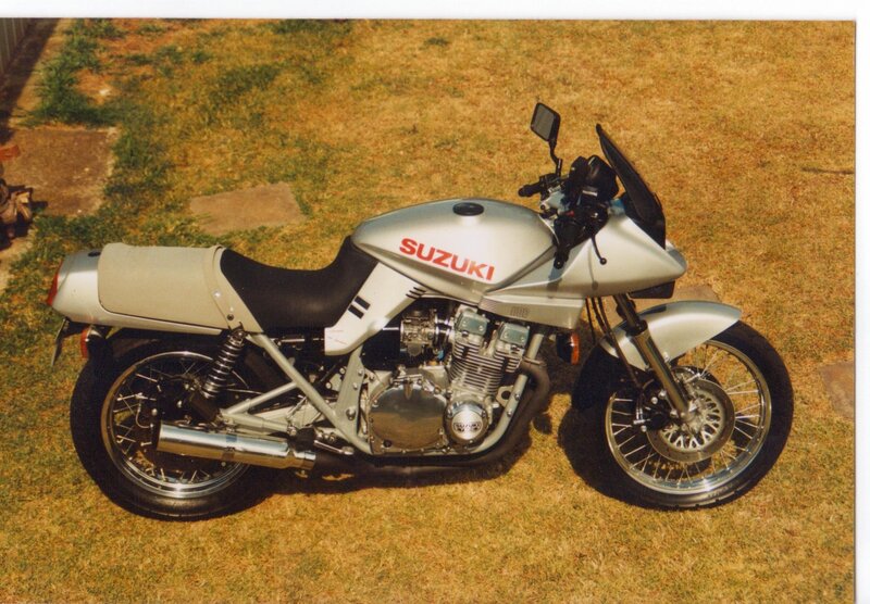 Silver Suzuki Motorcycle — Calm