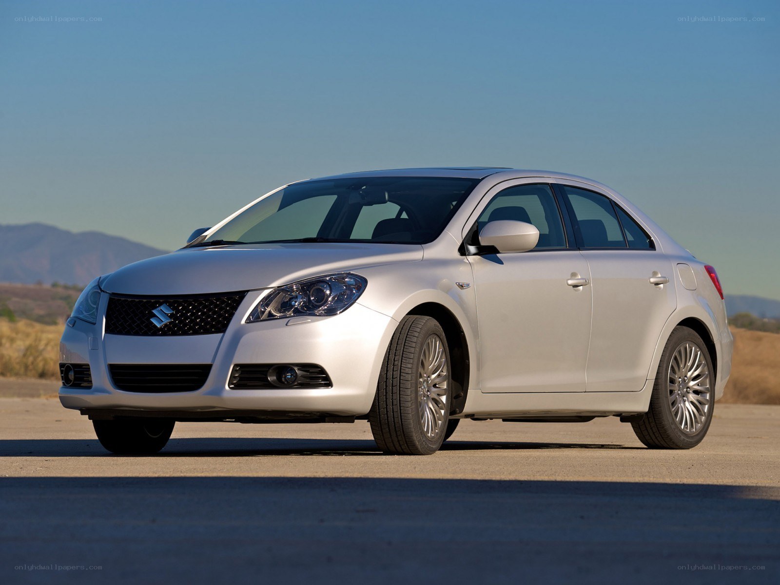silver suzuki sedan