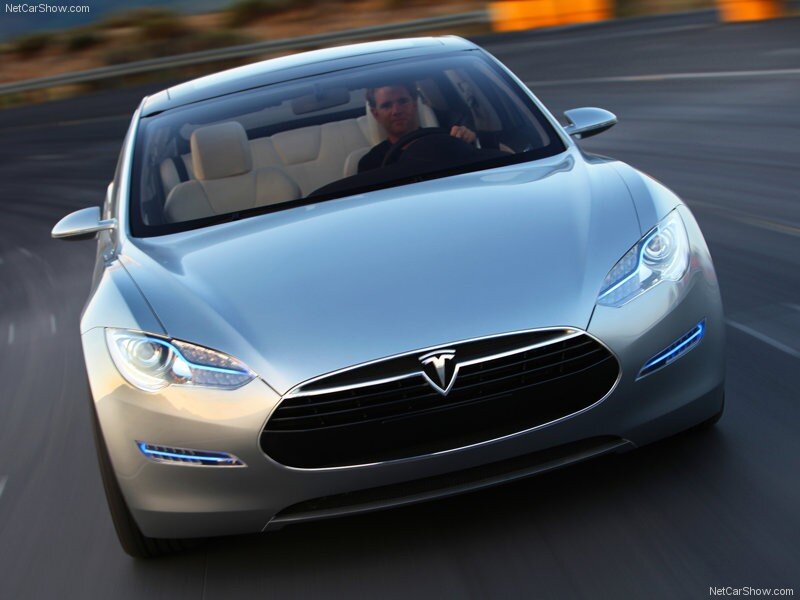 Silver Tesla Model S in motion