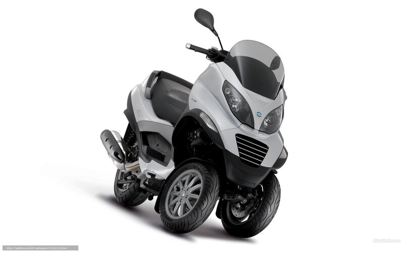 Silver three-wheeled scooter