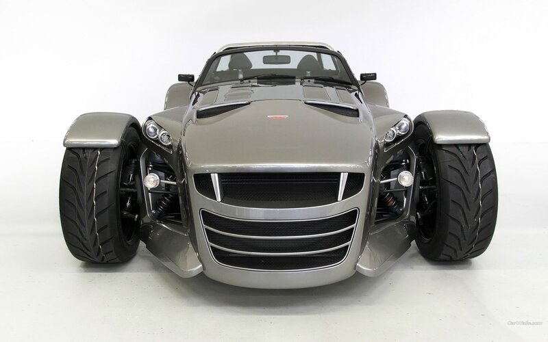 silver three-wheeled sports car