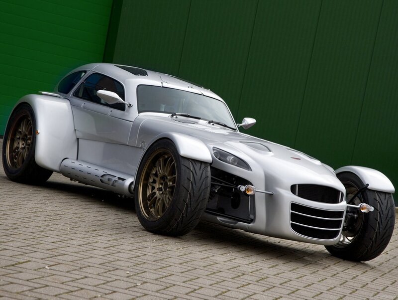 silver three-wheeled sports car