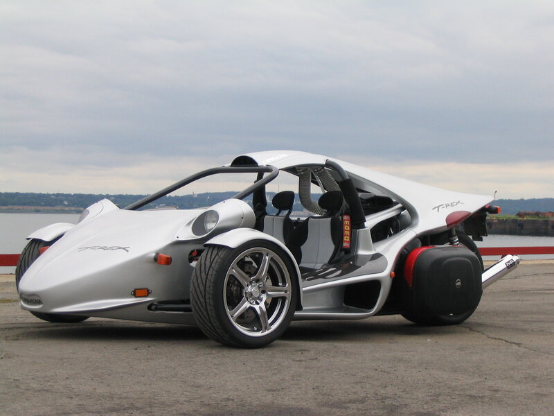Silver three-wheeled sports car