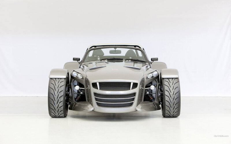 silver three-wheeled sports car