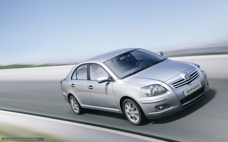 Silver Toyota Avensis in motion