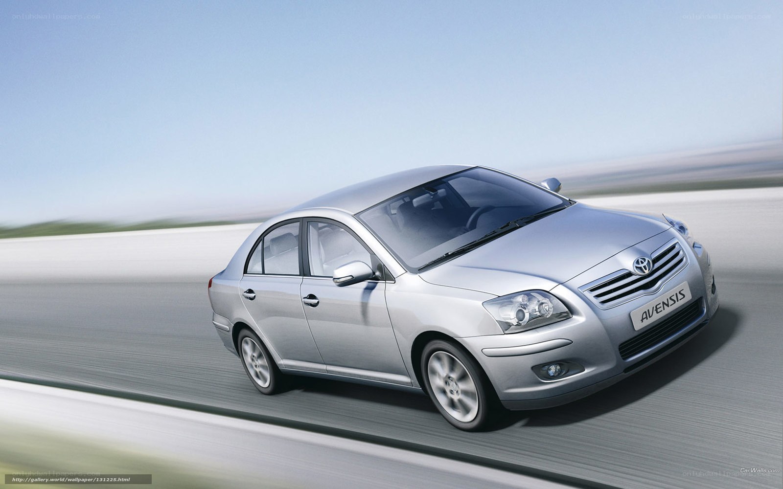 Silver Toyota Avensis in motion