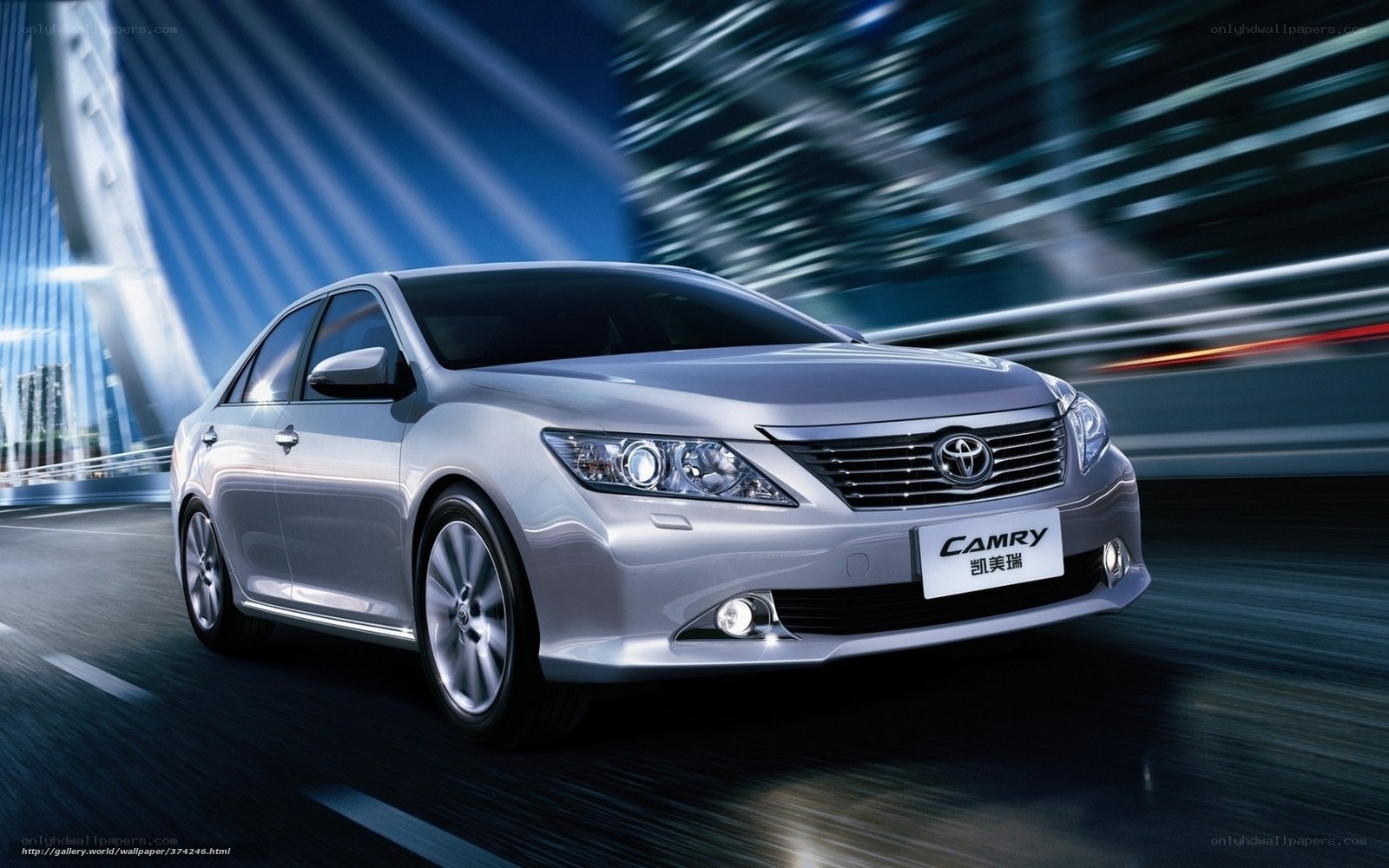 Silver Toyota Camry in motion