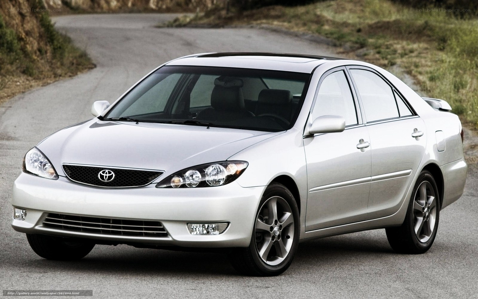 silver toyota camry on road