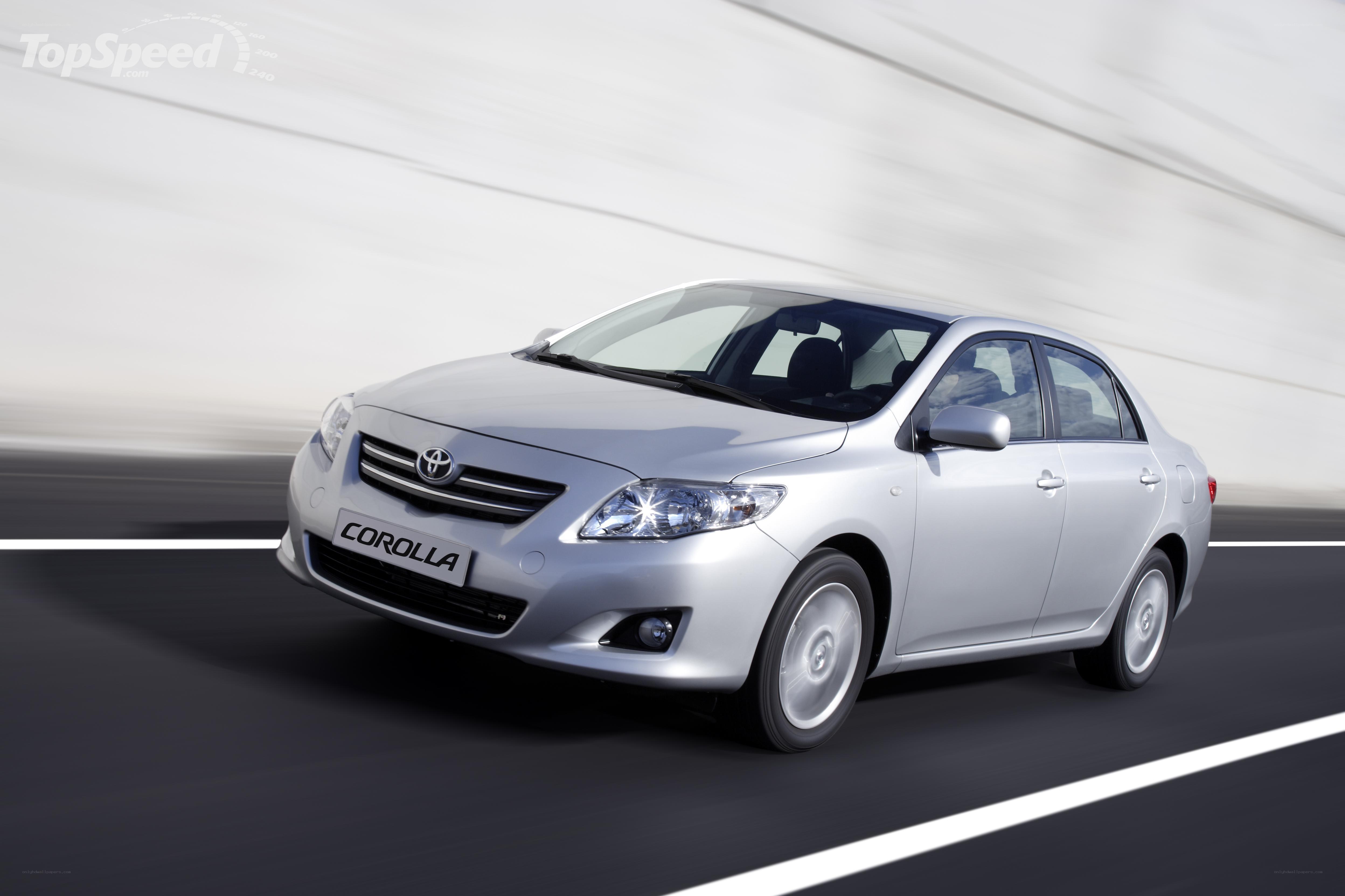 Silver Toyota Corolla in motion