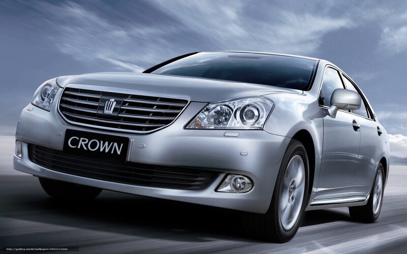Silver Toyota Crown in motion
