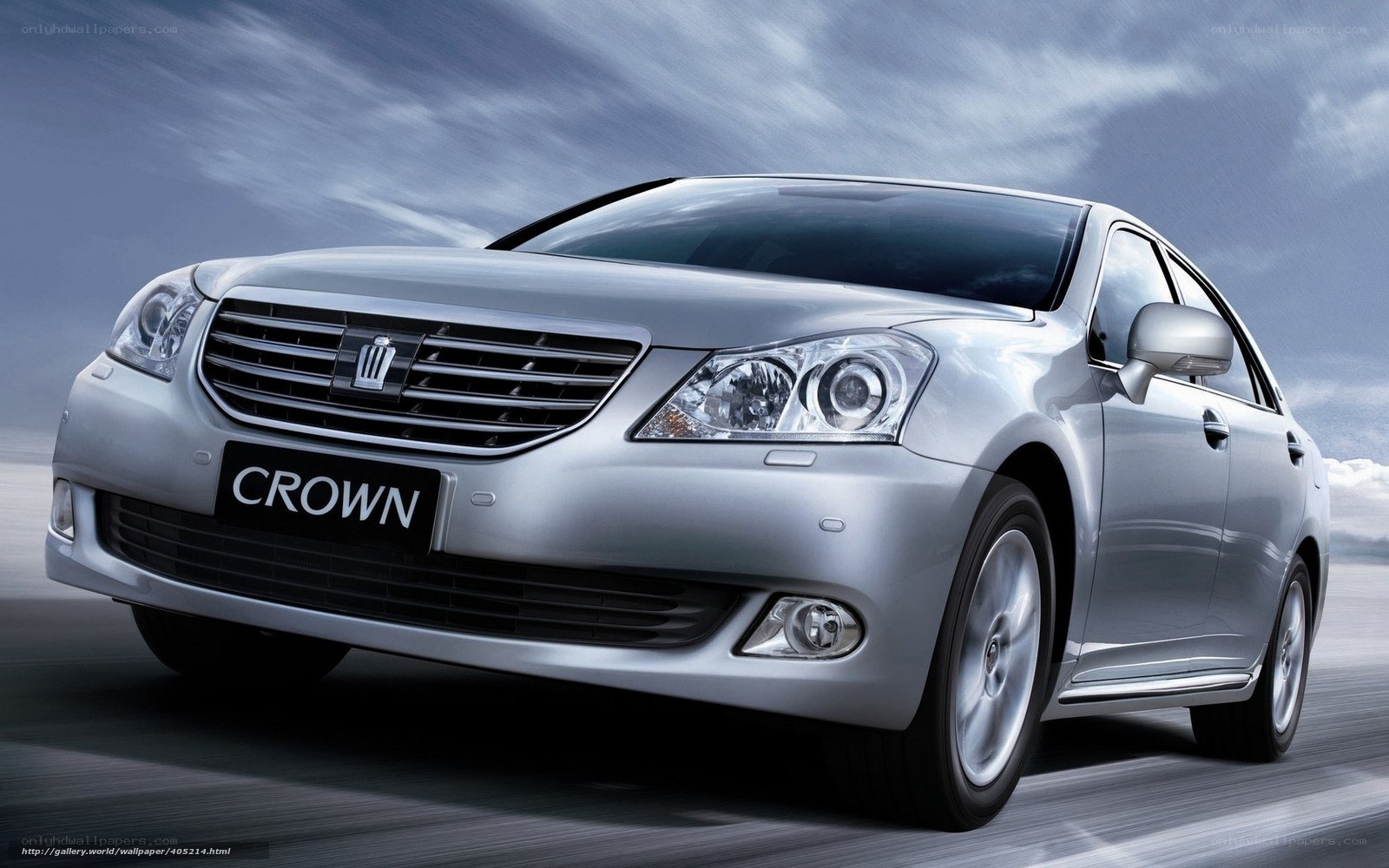 Silver Toyota Crown in motion
