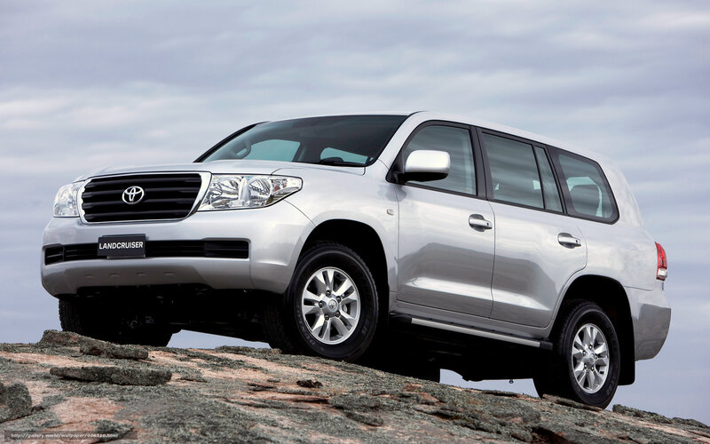 Silver Toyota Land Cruiser — Dramatic